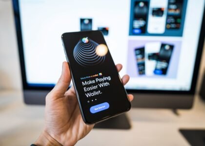 Person holding smartphone with a digital wallet app for DeFi