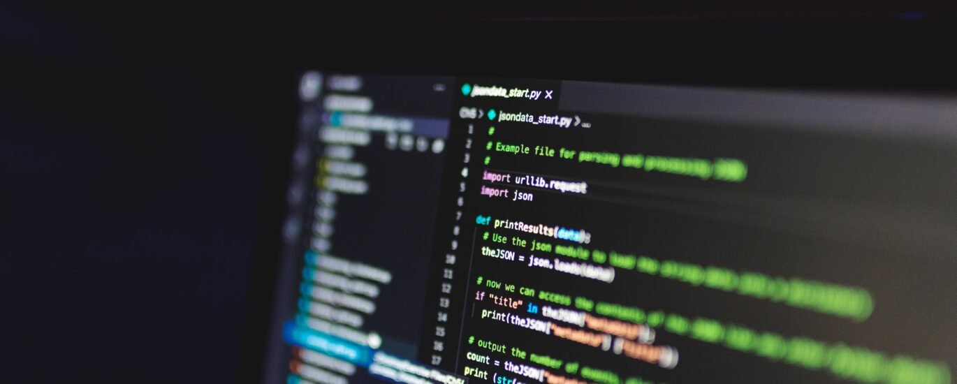Programming code on a computer screen representing DeFi smart contracts