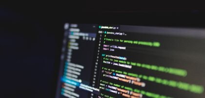 Programming code on a computer screen representing DeFi smart contracts