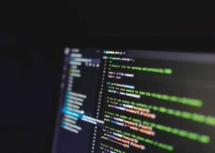 Programming code on a computer screen representing DeFi smart contracts
