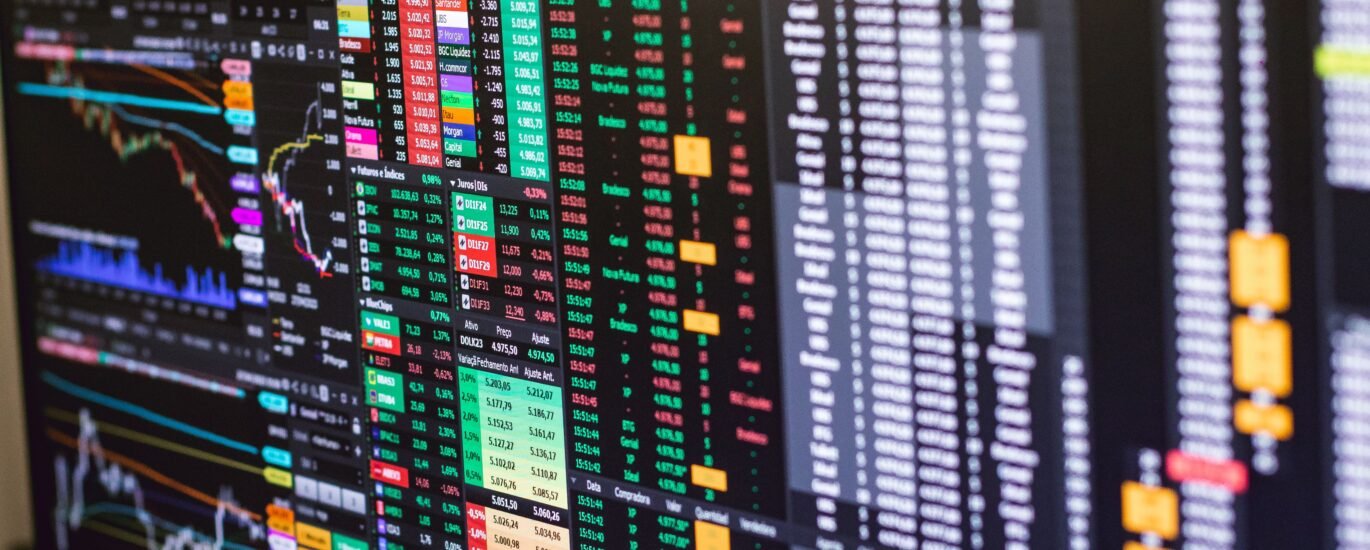 Financial trading screen with colorful candlestick charts representing crypto chart patterns