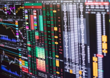 Financial trading screen with colorful candlestick charts representing crypto chart patterns