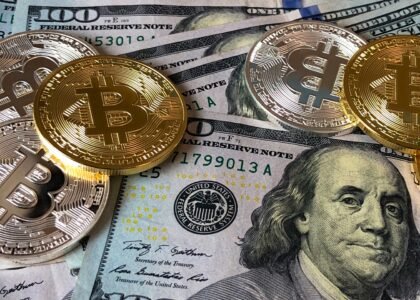 Bitcoin coins placed on US dollar bills representing decentralized finance